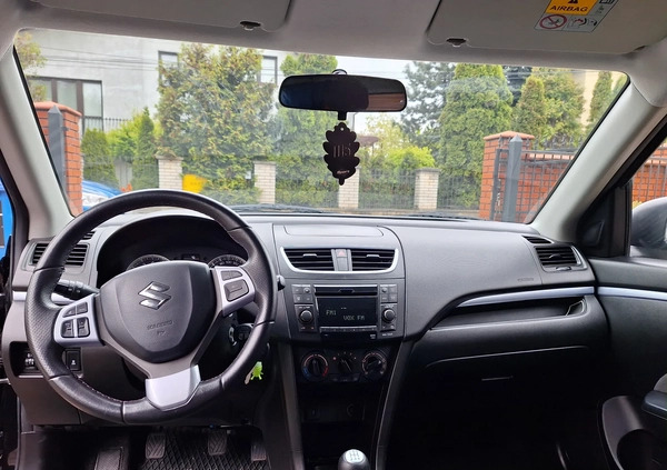 Suzuki Swift cena 34700 przebieg: 100200, rok produkcji 2015 z Żychlin małe 326